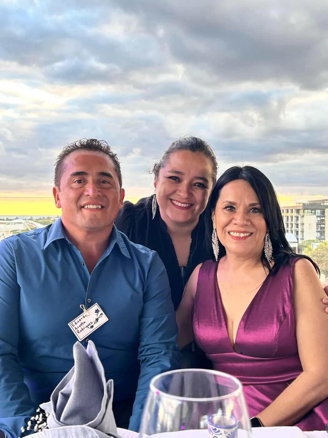With guests at a sunset reception