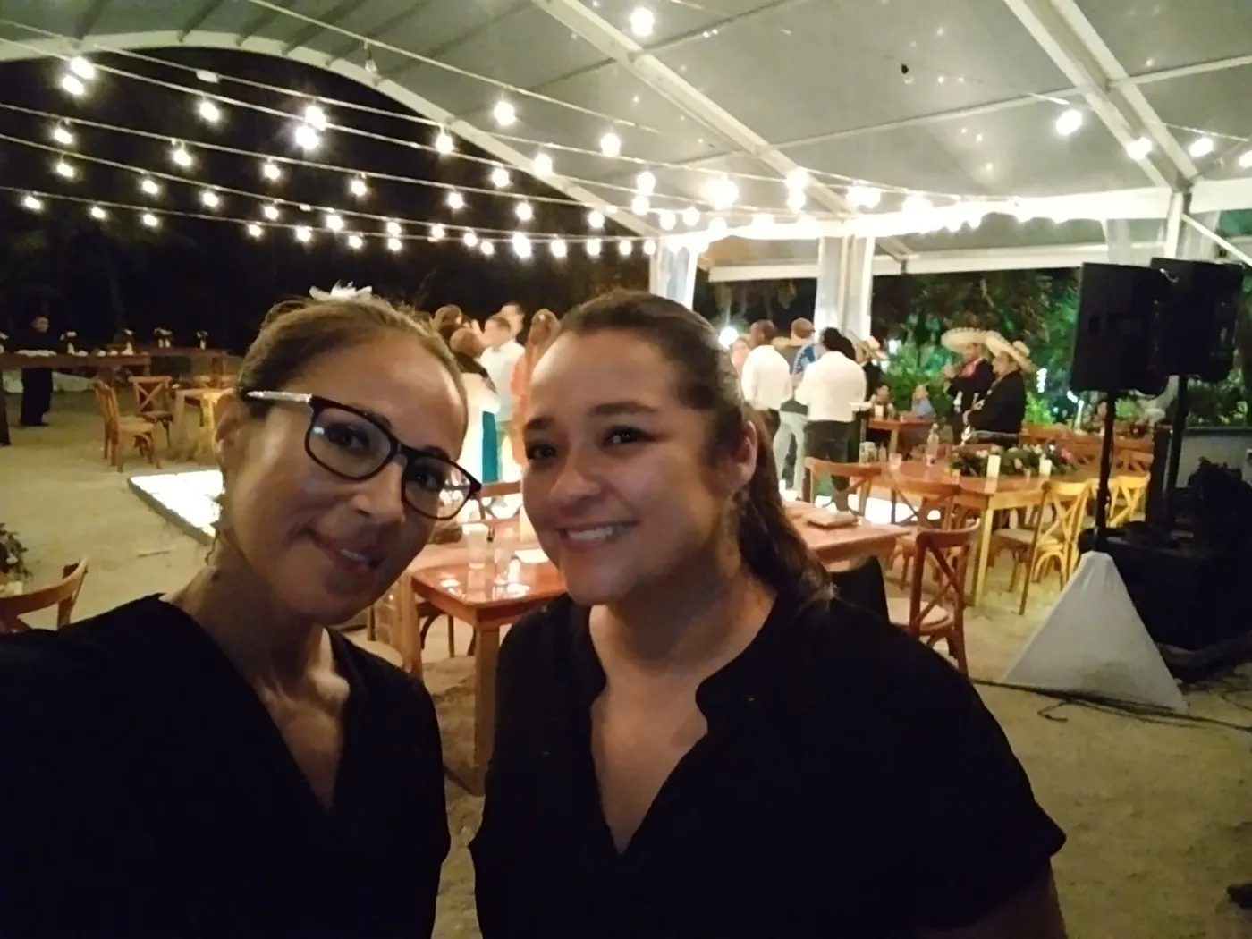 With a colleague during a beachfront wedding reception