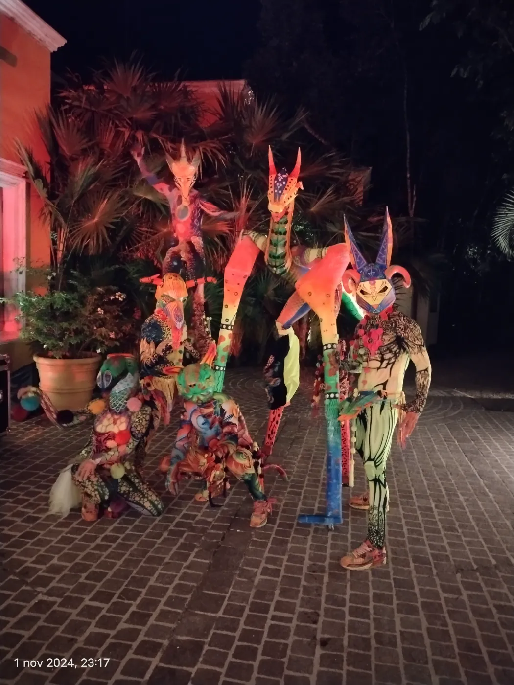 Alebrije stilt performers at a Día de Muertos production