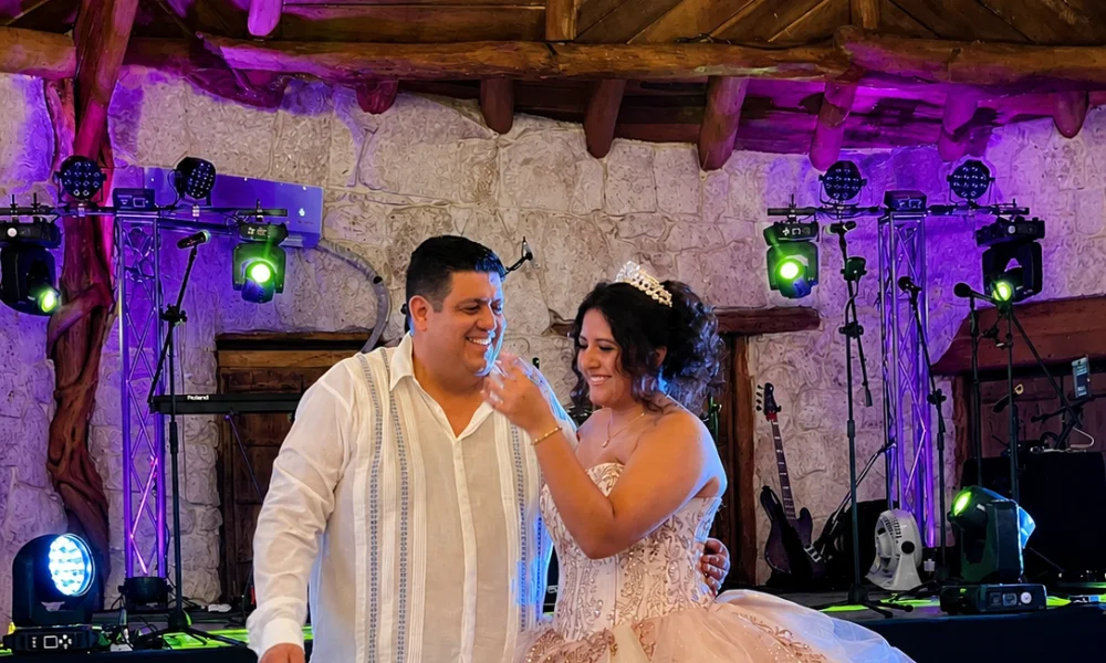 Quinceañera toast with her family at the reception